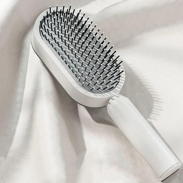 Щетка для волос 3D Central Hollow Cushion Comb массажная с кнопкой очистки для начесывания и укладки